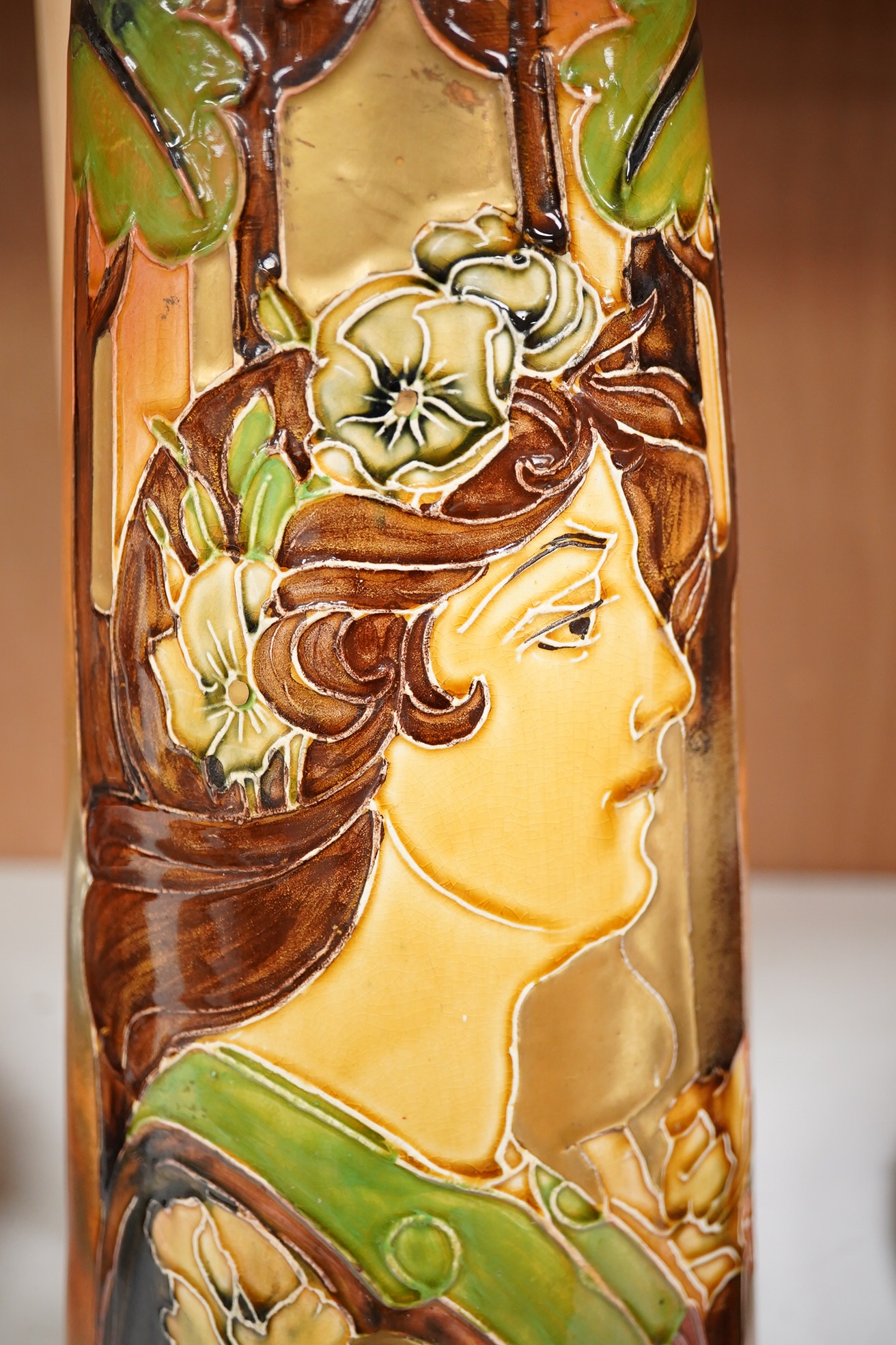 A Continental Art Nouveau tube lined ‘maiden’ vase, 36cm high. Condition - fair